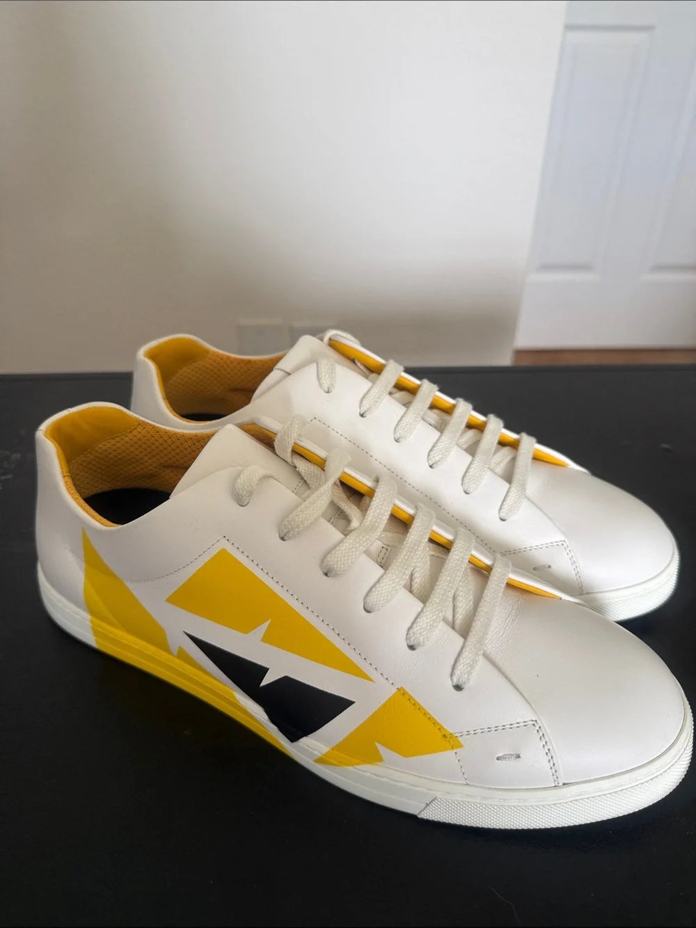 Fendi White Leather Low-Top Sneakers with Yellow and Black Graphic